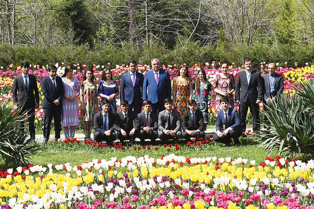 President Emomali Rahmon and his son meeting constituents in Dushanbe on April 6. (Presidential press service)